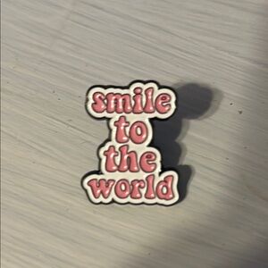 'Smile to the World' pin